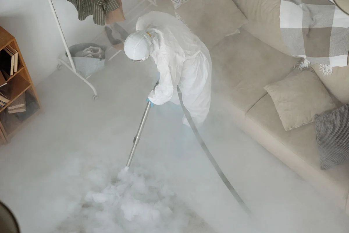 Biohazard cleanup technician in protective equipment, Slaughter, LA
